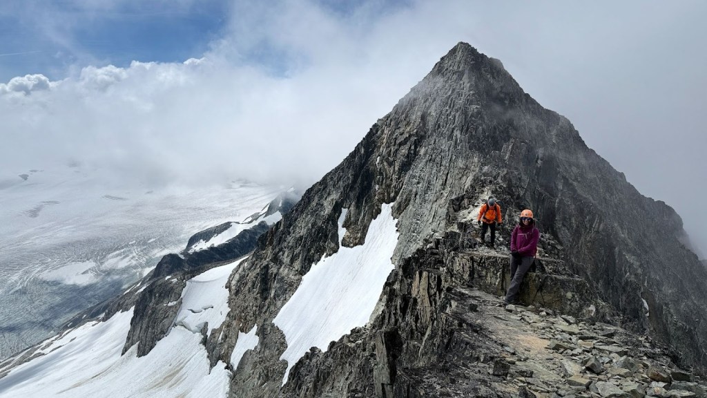 Scrambling along the exposed ridge of the Armchair Traverse between Mount Cook and Mount Weart